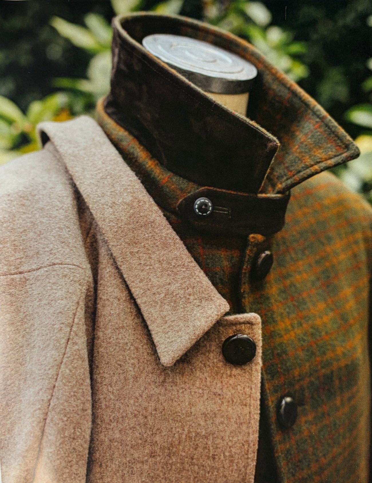 a brushed wool collar and a green check lining, close up